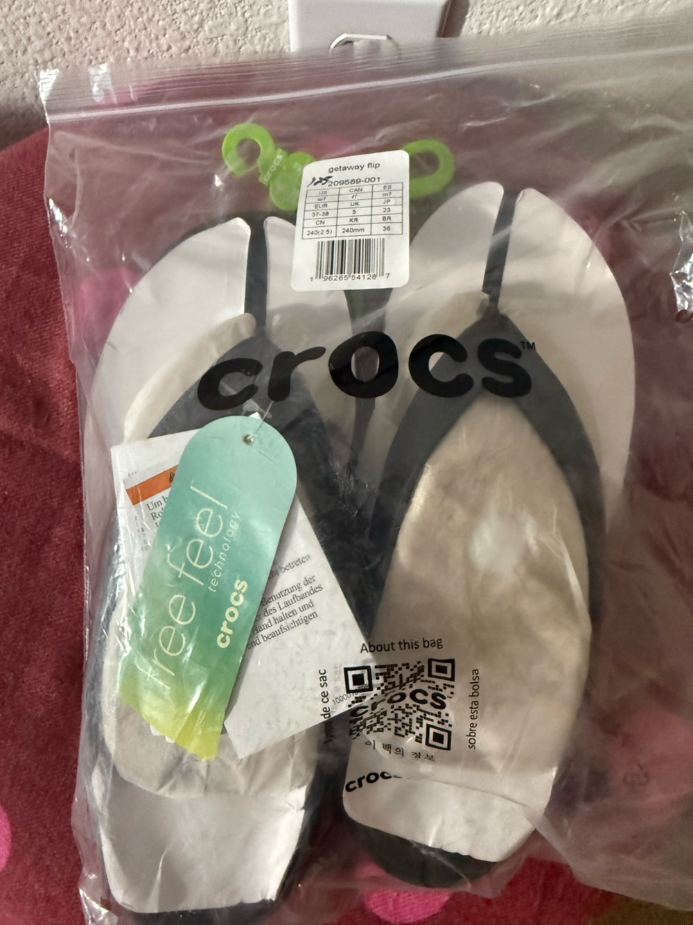 Crocs Flip Flop Sandals in White and Black